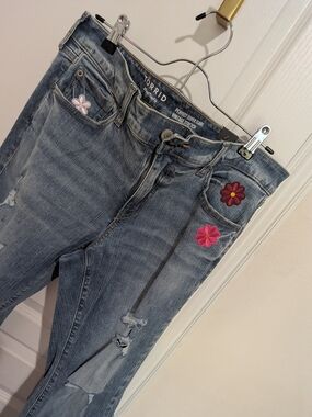 torrid denim jeans with embroidered pink & red flowers